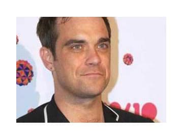 Robbie Williams sľubuje veľký návrat
